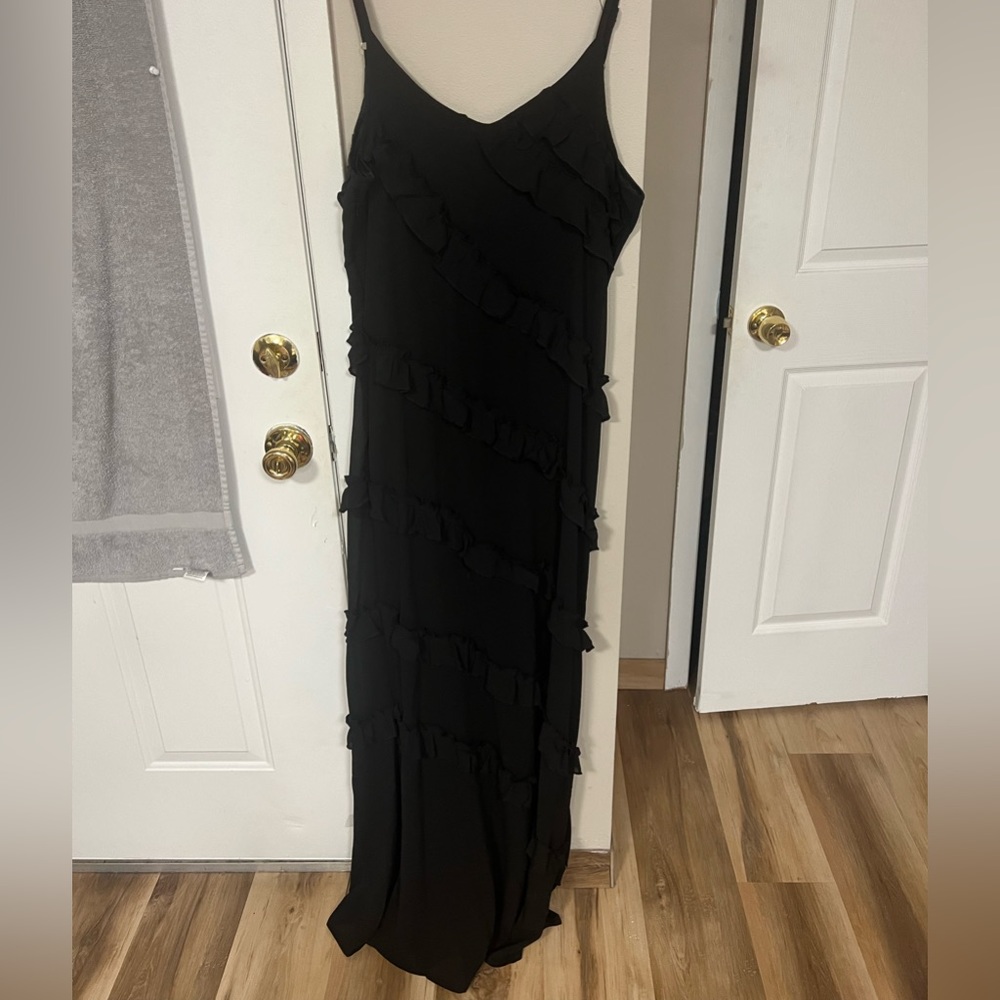 Black dress with diagonal ruffles
